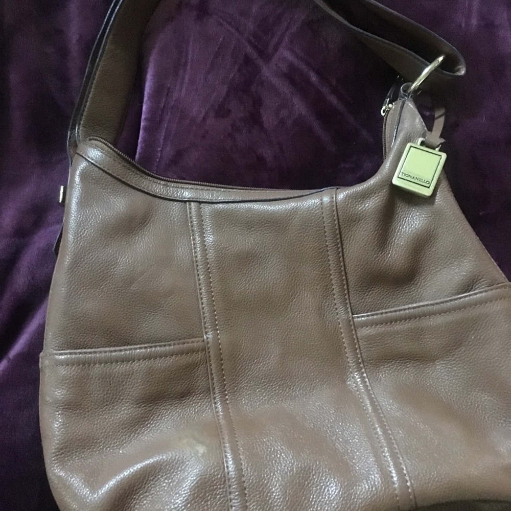 Used Tignanello purse 100% leather.